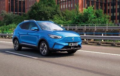 Blue SUV driving on the road